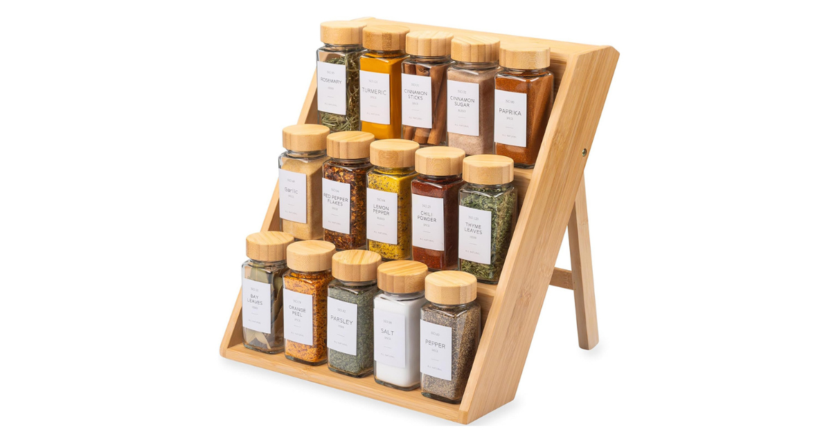 Close-up of bamboo rack with neatly arranged spice jars