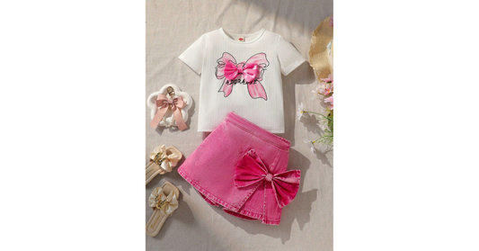 Toddler girl wearing 3D bow T-shirt and pink skirt set