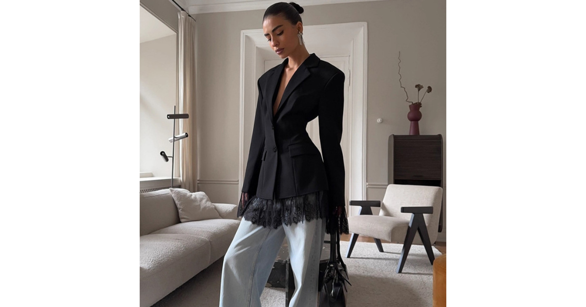 Black crop blazer for women on model with office outfit