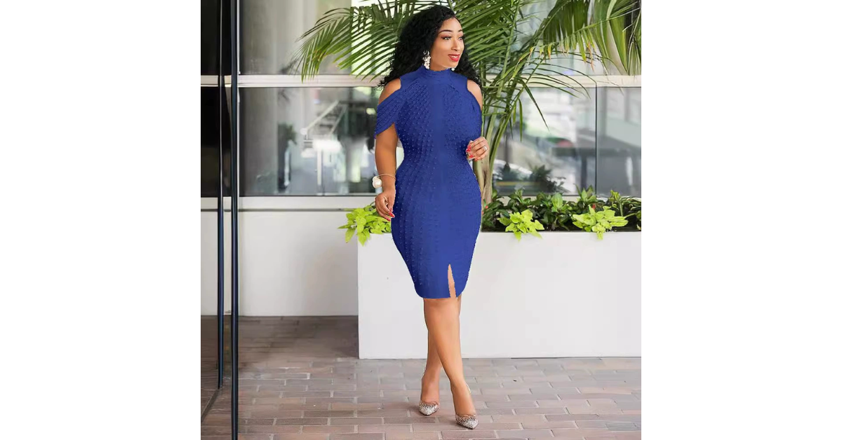 Blue midi bodycon dress styled with minimal jewelry and heels for an elegant evening look.