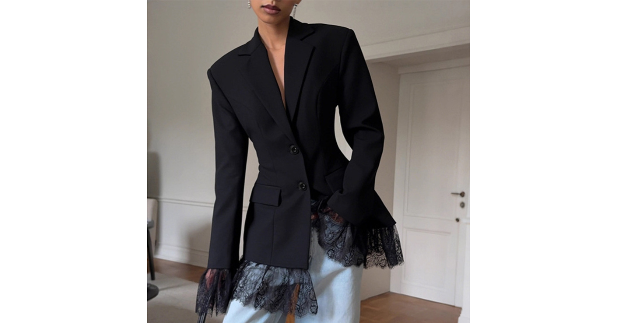 Black crop blazer styled with casual jeans
