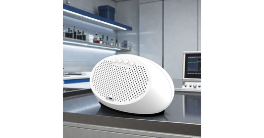 DM605E indoor air quality monitor on a wooden desk