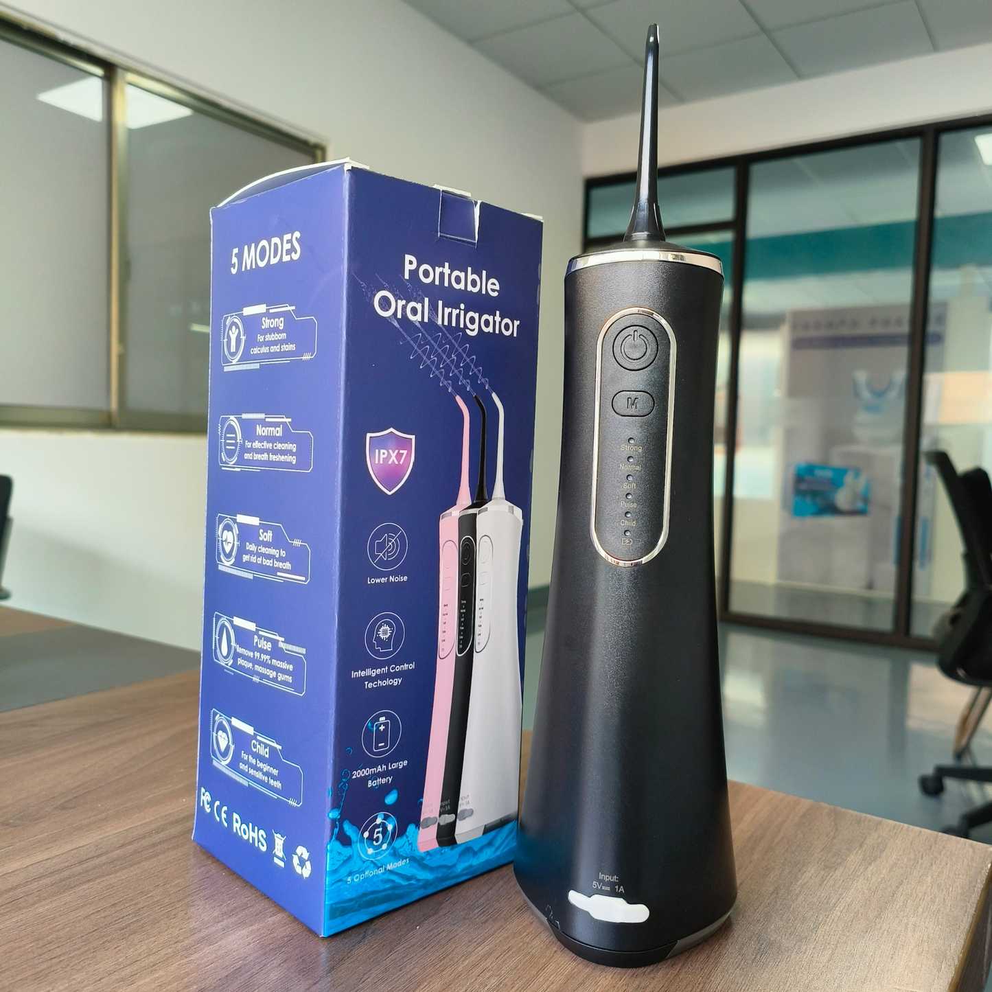 Electric Water Flosser with 360° rotating nozzle designed to clean hard-to-reach areas between teeth.