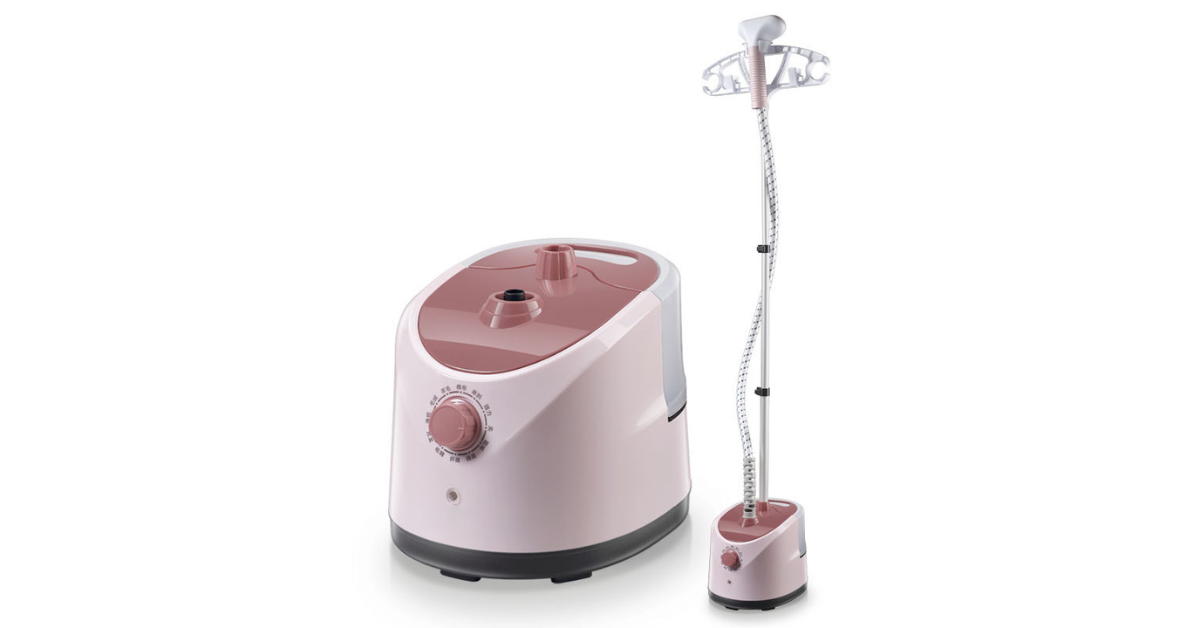 portable mini clothes steamer in use