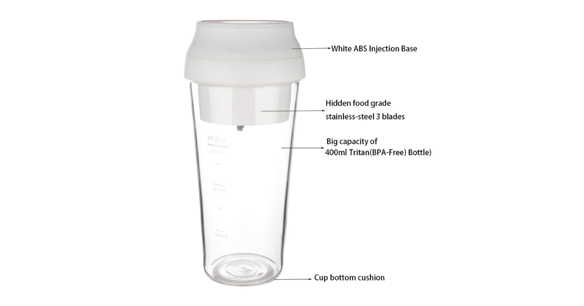 portable usb blender on a desk with fruit