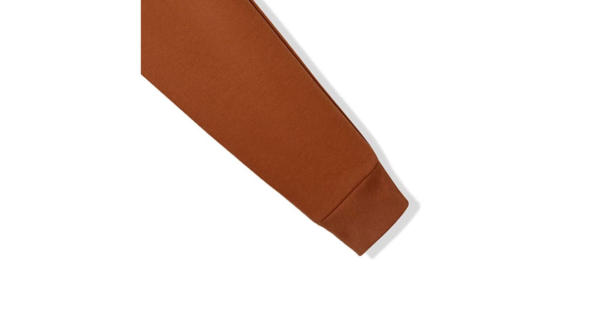Side view showing loose fit and stacked hem