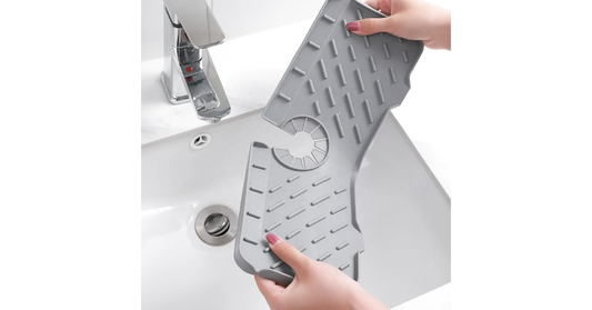 silicone sink splash guard behind faucet