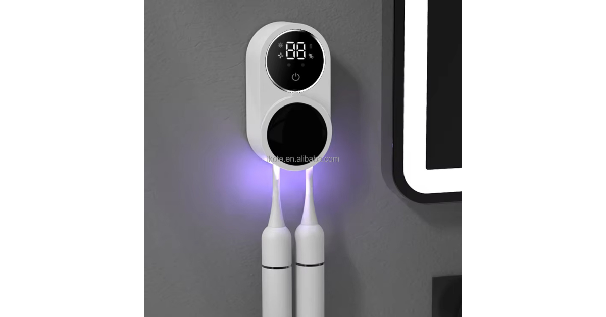 UV toothbrush sanitizer mounted on bathroom wall