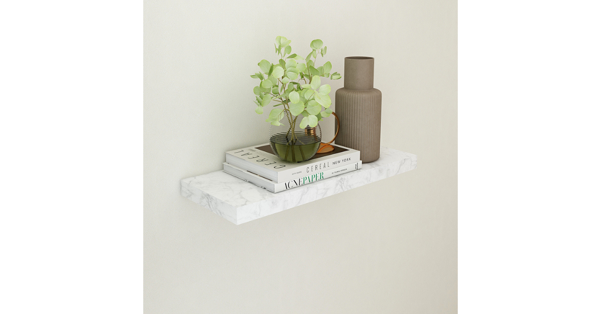 Wooden floating shelf mounted on wall holding books