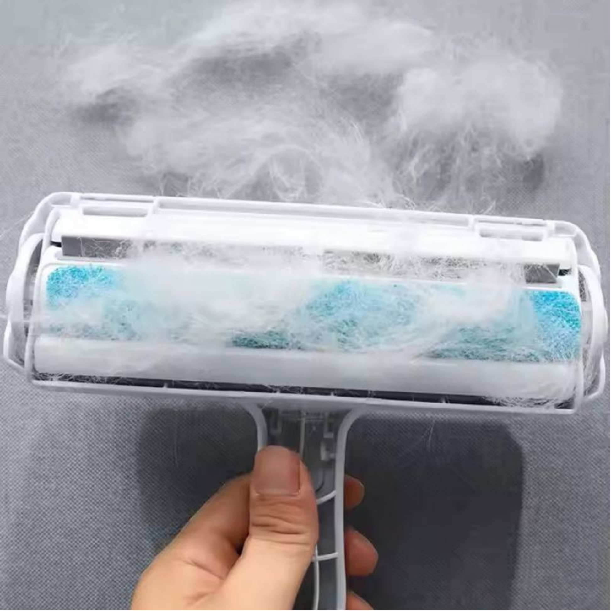 Self Cleaning Pet Hair Remover Roller collecting pet fur inside its built-in storage chamber.