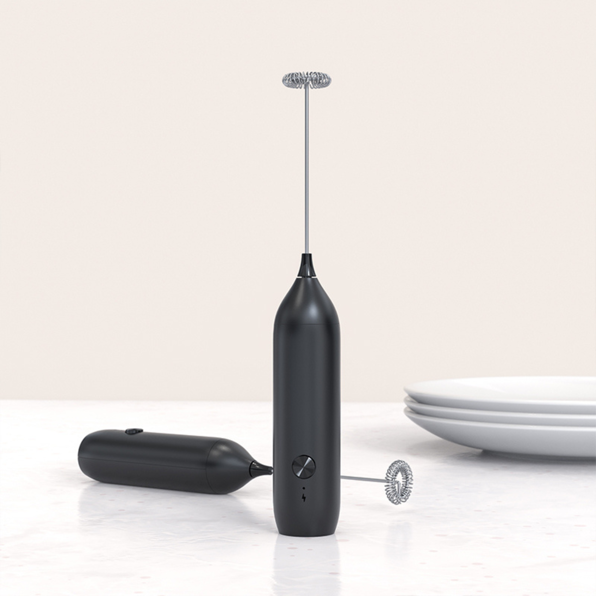 Premium Handheld Milk Frother being used to prepare creamy cappuccino at home.